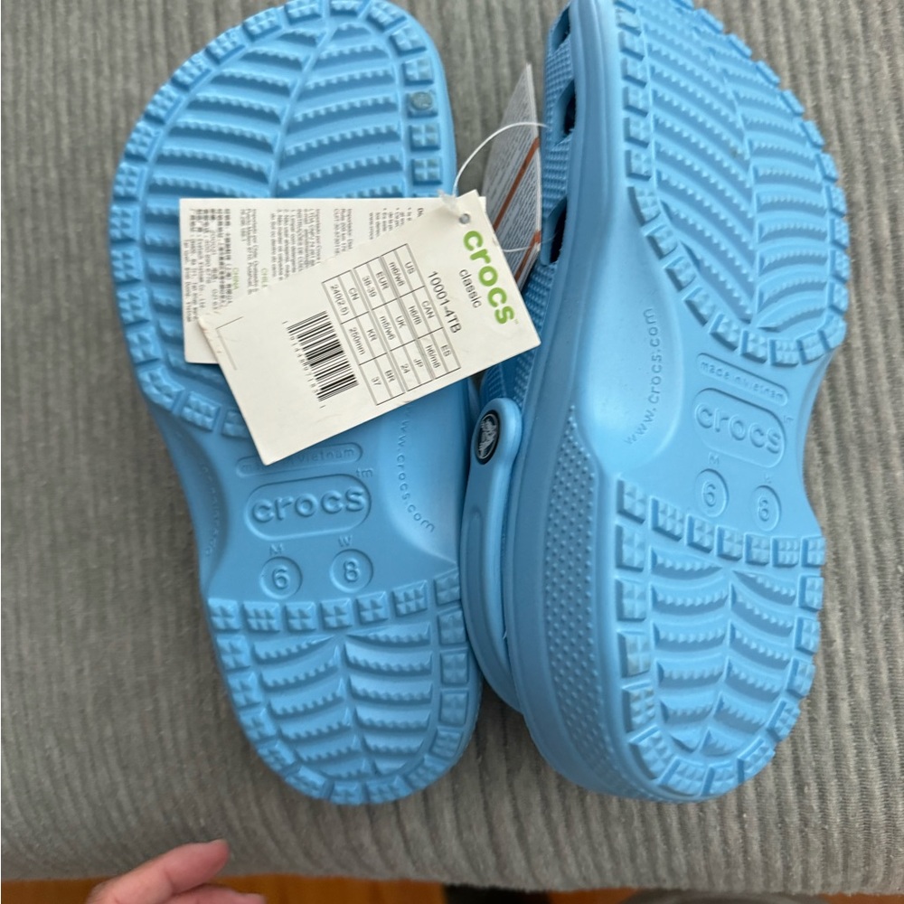 Brand new baby blue crocs